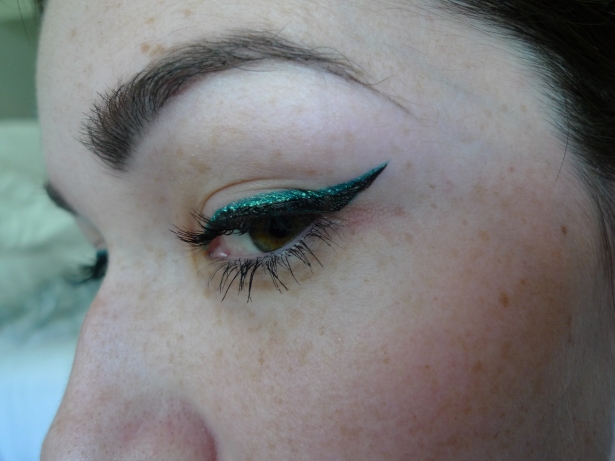 I did a larger wing with the MUFE liner, then went over it with the Stila pen.